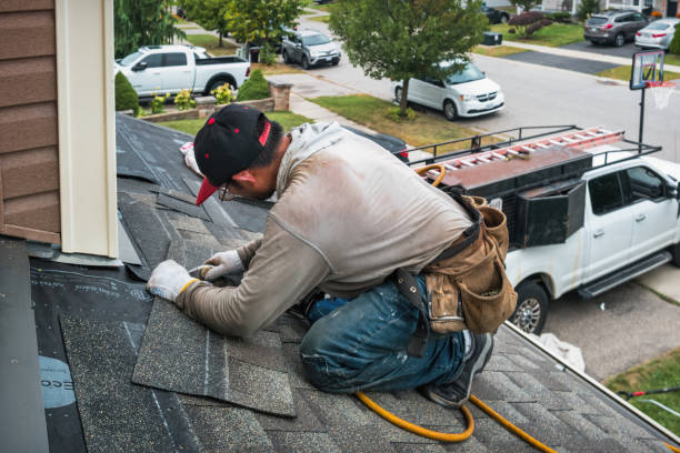 Professional Roofing technician working in Hopkinton, MA